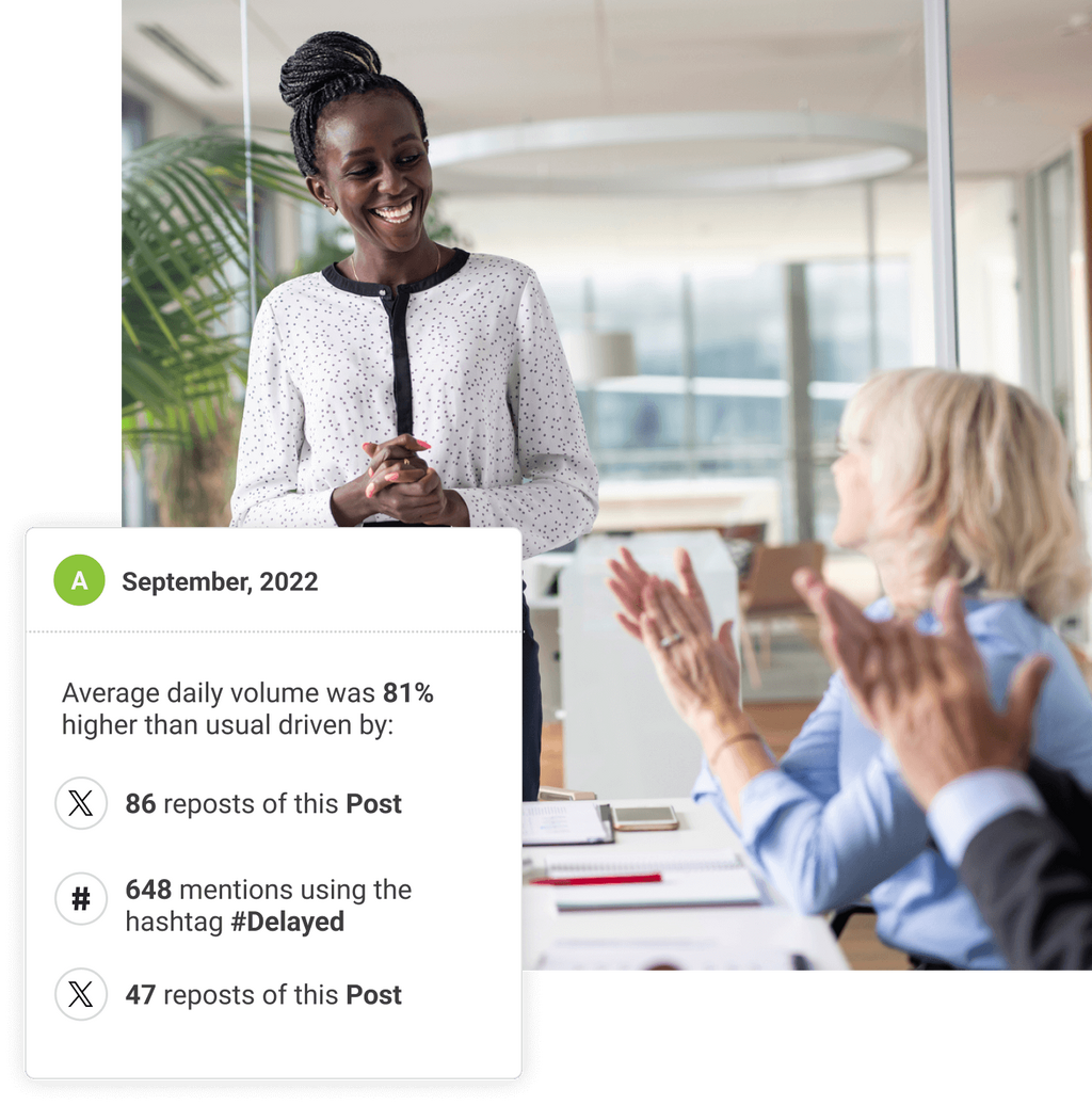 Two women having a discussion in an office setting
